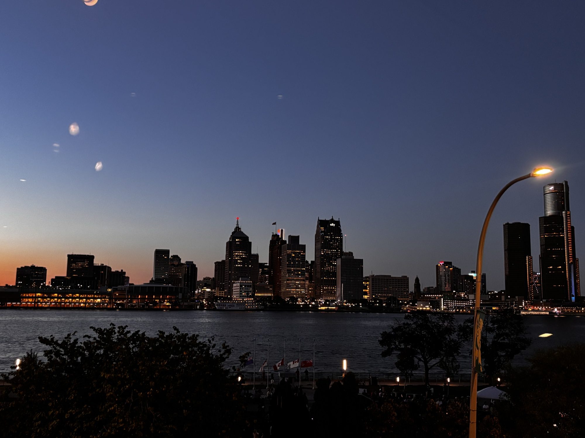 Detroit skyline across the river at dusk
